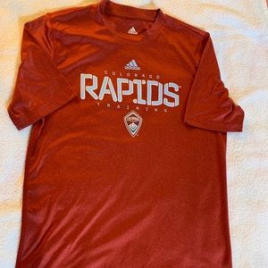 Adidas Rapids Shirt, Size Kids XL, fits more like an adult XS or Small.